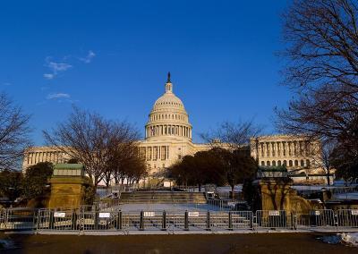 Us Capitol With Steel Barriers